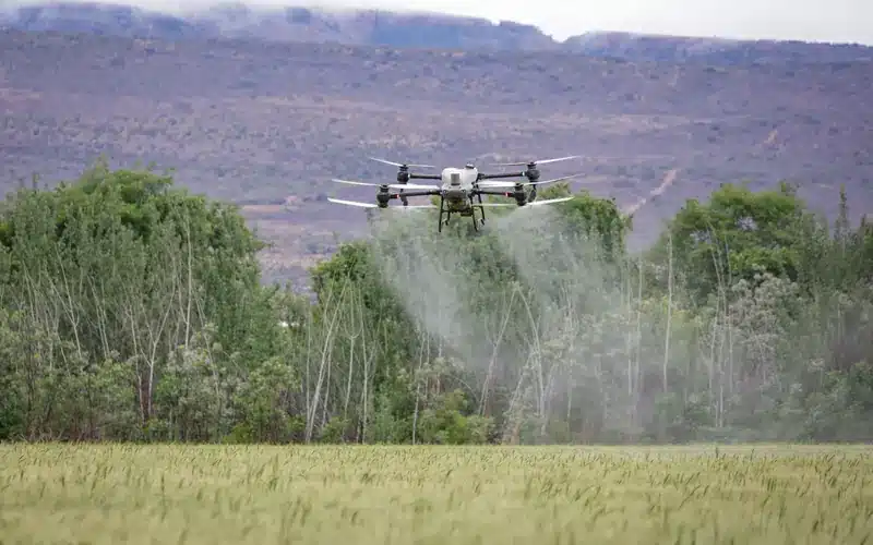 Agricultural drone operating above a field as part of a technology baseline