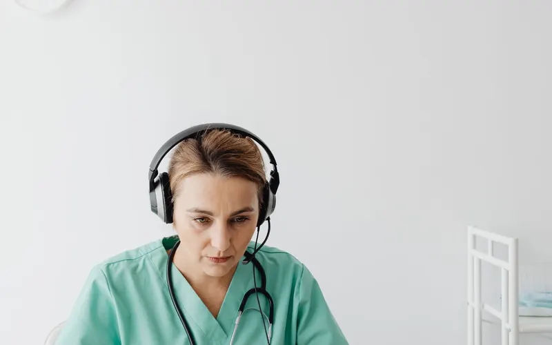 Doctor conducting a secure video consultation from a medical office