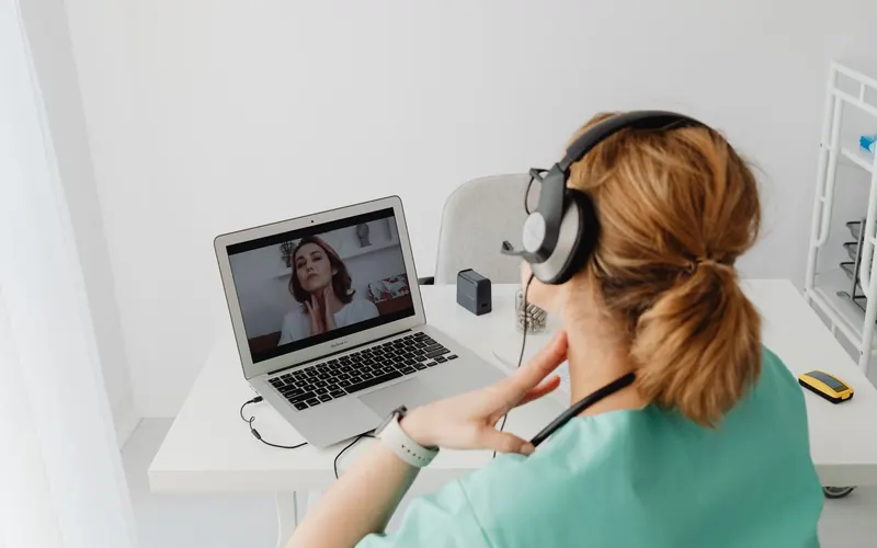 Healthcare professional using a laptop for a secure remote consultation