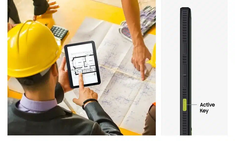 Construction team using a rugged Samsung tablet one-handed over building plans